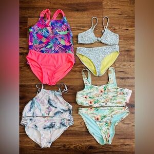 Set of 4 girls 2 piece swimsuits.  Size 12.  Various brands
